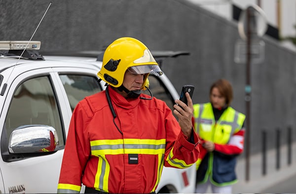 Firefighter using a smartphone
