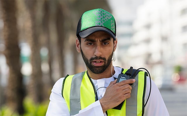 Security professional carrying a TH1n TETRA radio