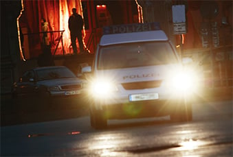 German-police-car-with-lights-on-339x229